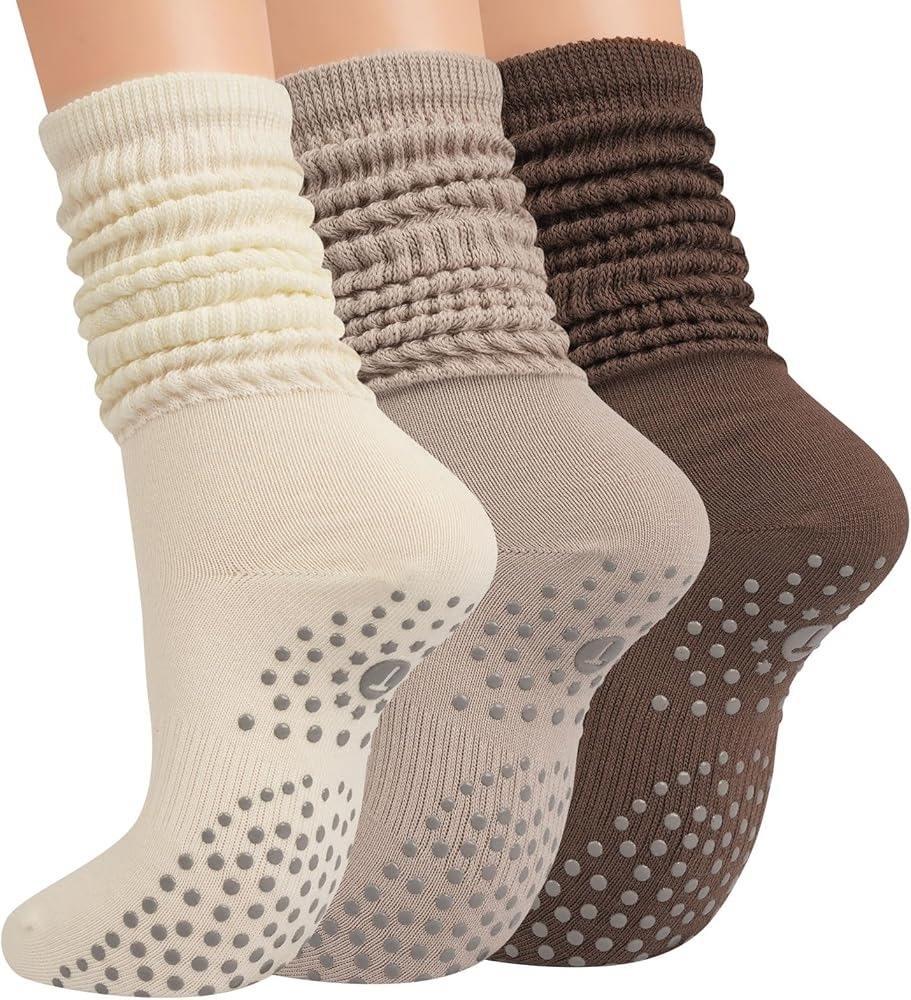 Assorted colored grip socks with ribbed cuffs and silicone traction pads on the soles, designed for secure indoor movement