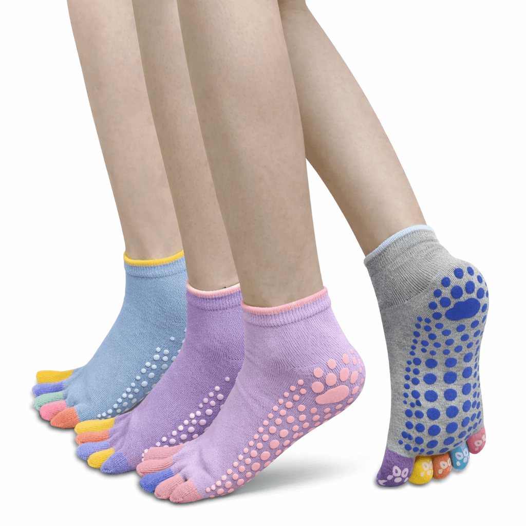 three pairs of colorful toe grip socks with anti slip silicone dots for yoga pilates fitness training