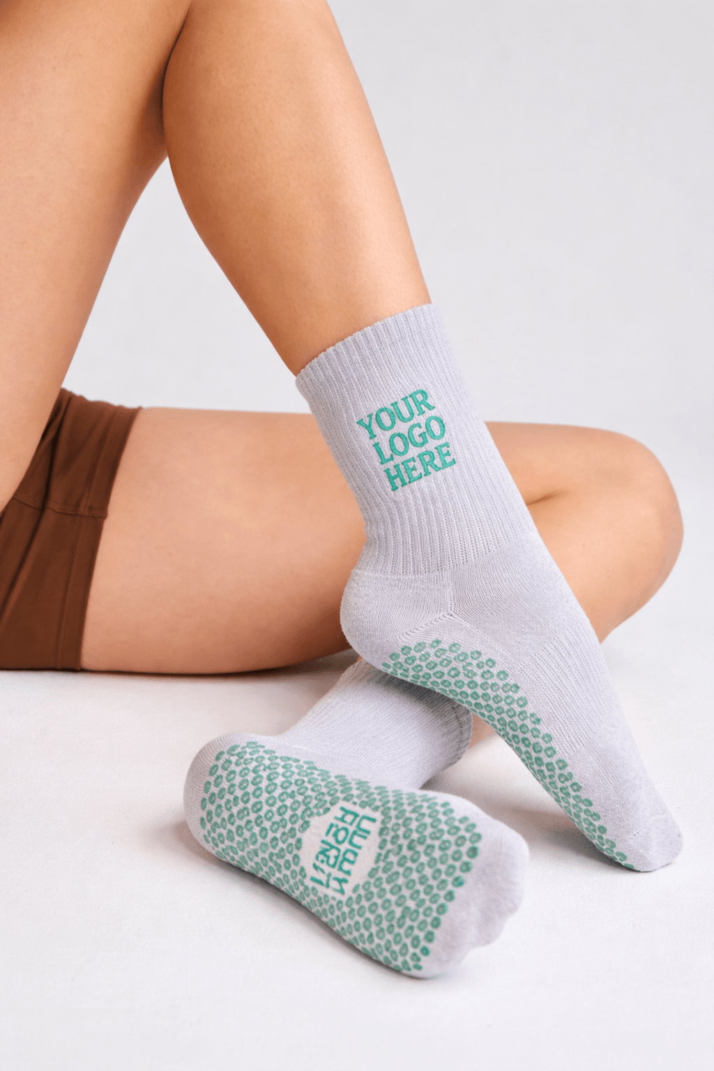 branded grip socks with custom logo placement, logo grip socks for fitness brands and custom logo grip socks manufacturing supply