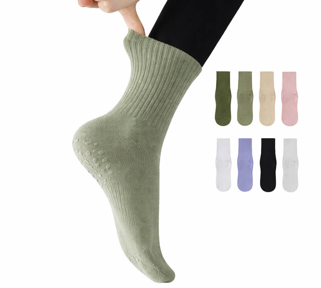 private label pilates socks in ribbed green fabric, branded pilates grip socks with custom color options for fitness brands