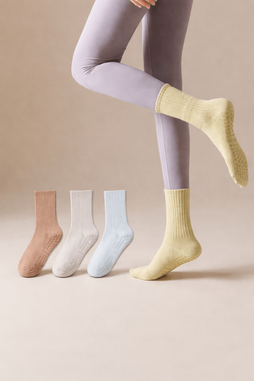 custom yoga grip socks collection with multiple colors, non slip custom yoga socks for studio use and private label branded yoga grip socks manufacturing