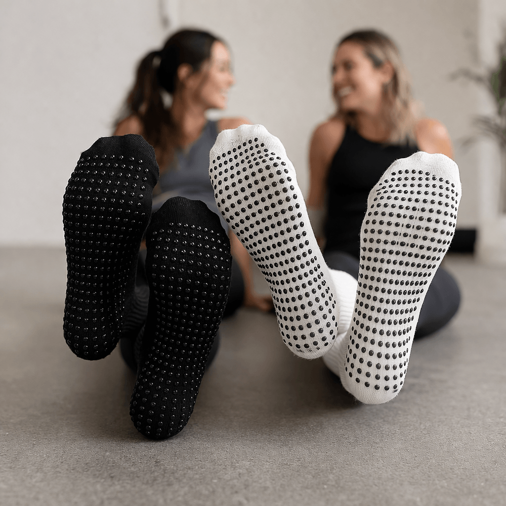 custom pilates grip socks with silicone dot sole pattern black and white studio scene