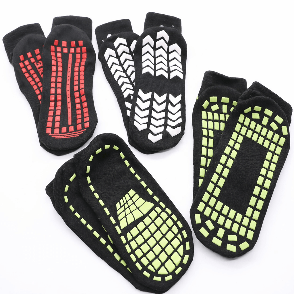 custom logo grip socks with multiple anti slip patterns, branded grip socks for trampoline parks, gyms and custom logo grip socks OEM production