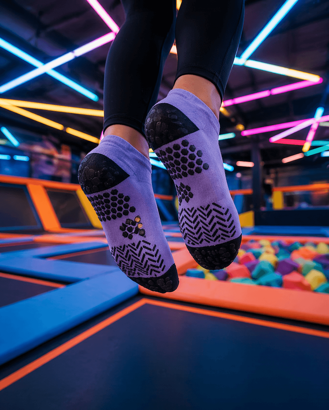why trampoline parks require grip socks showing non slip trampoline socks improving traction and trampoline socks safety