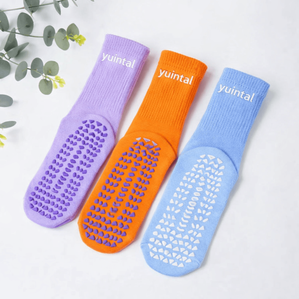 custom colorful grip socks with silicone pattern from private label grip socks manufacturer OEM branded yuintal socks