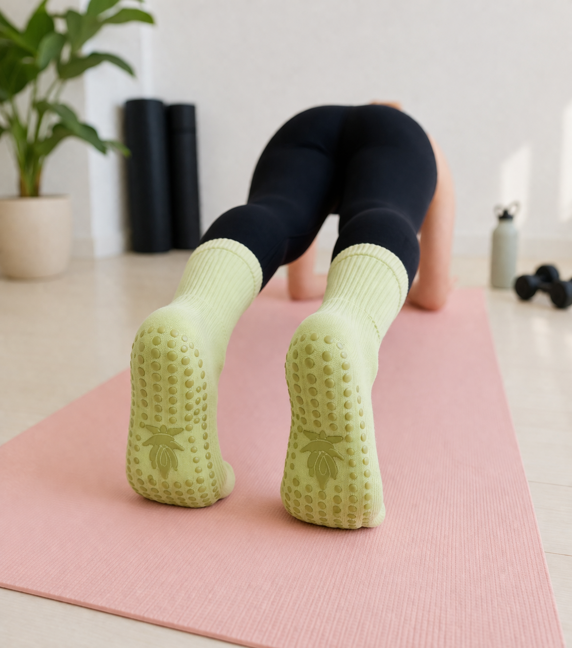 Best pilates grip socks in light green with full-sole non-slip dots, ideal for yoga and pilates workouts, showcasing pilates grip socks benefits like enhanced stability and grip during planks and floor exercises, one of the best socks for pilates.