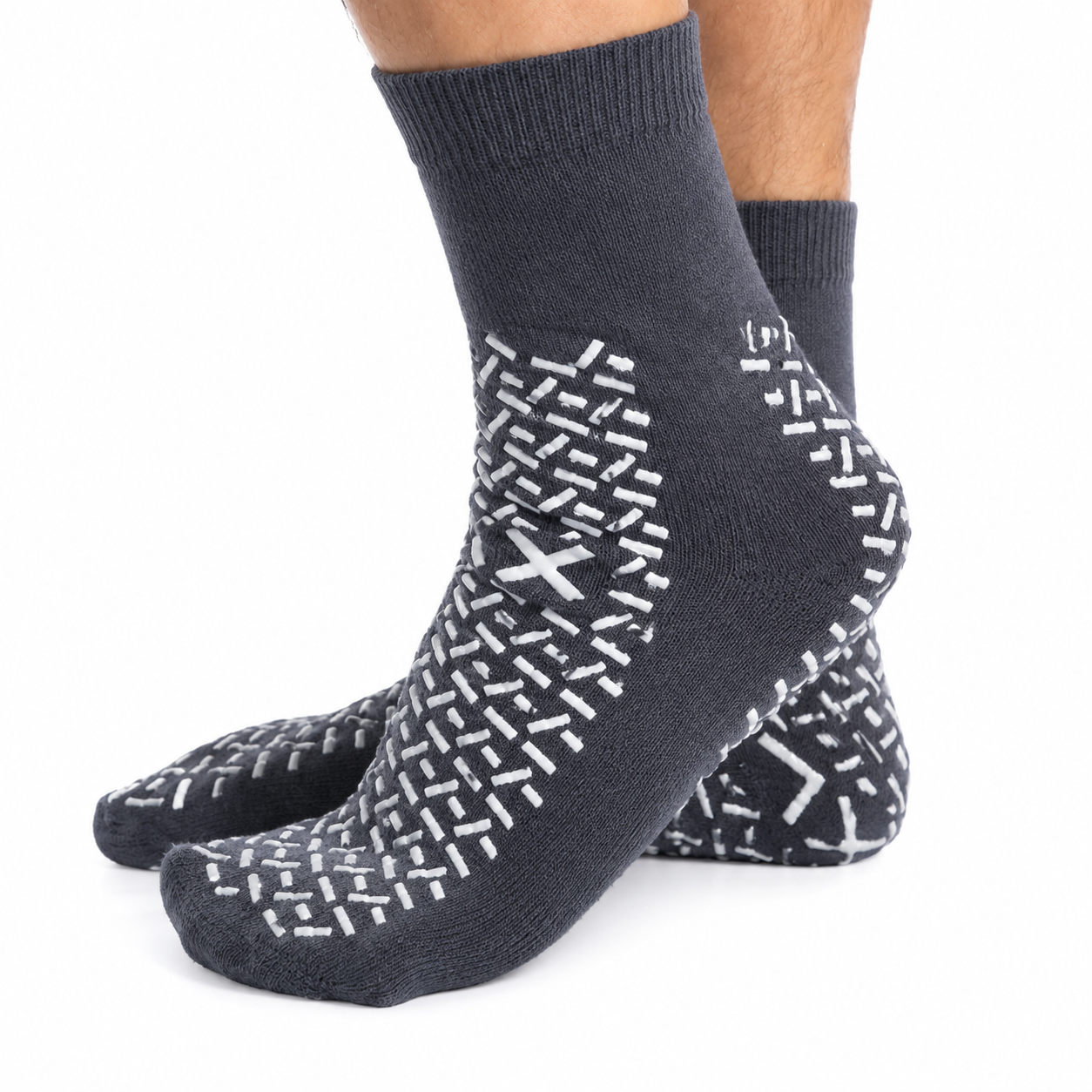 hospital socks vs grip socks close-up of dark gray medical grip socks with full silicone traction pattern for hospital walking and fall prevention