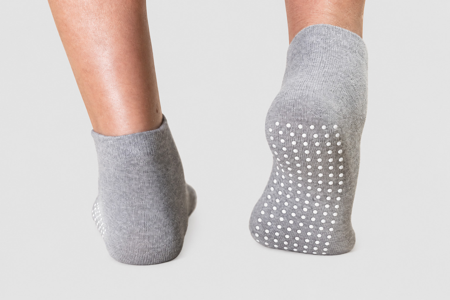 What Determines Grip Socks Performance Across Different Floor Types