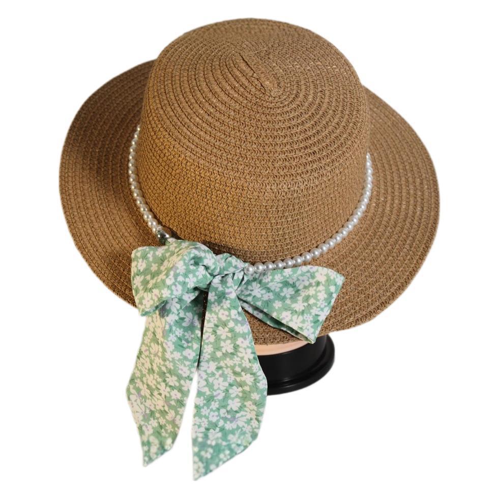 New style round-top straw hat with polka dot ribbon and pearl trim, perfect for beach outings.