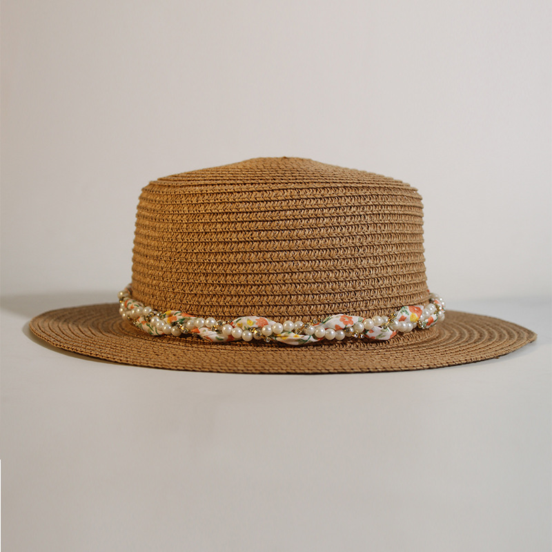 Hat band New style round-top straw hat with polka dot ribbon and pearl trim, perfect for beach outings.
