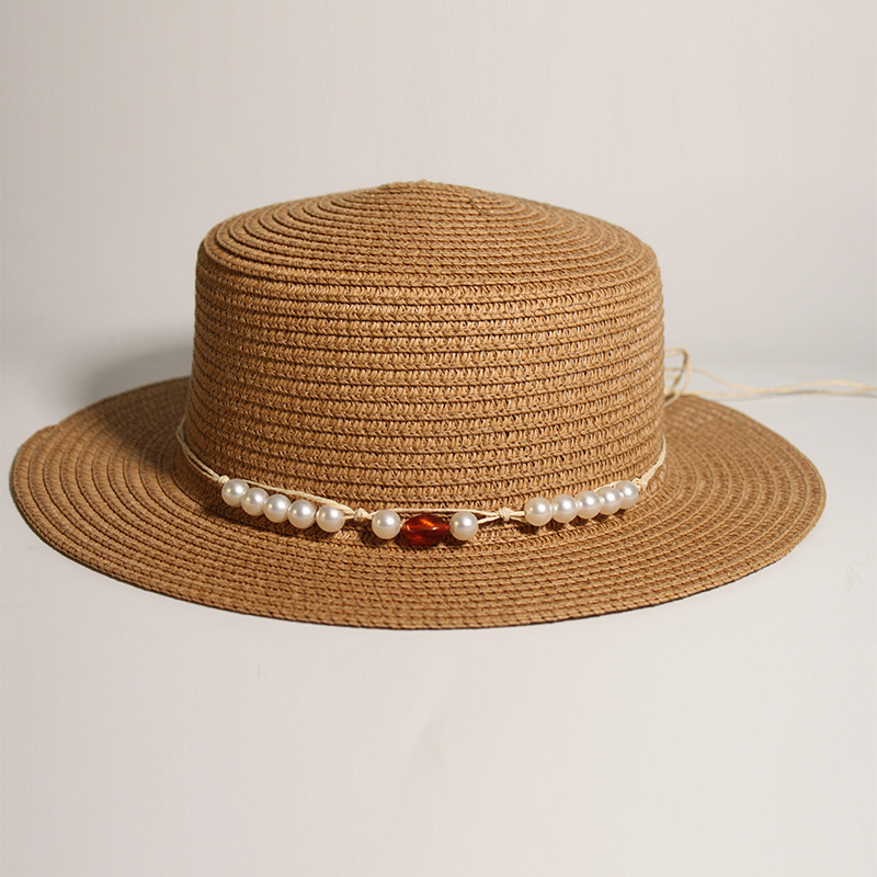 Hat band New style round-top straw hat with polka dot ribbon and pearl trim, perfect for beach outings.