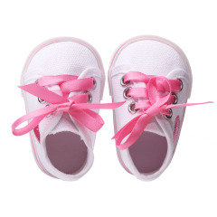 White shoes with red hearts