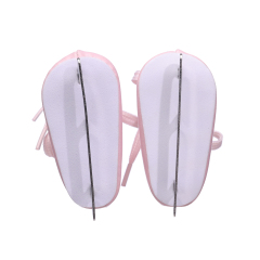 Pink ice skating shoes