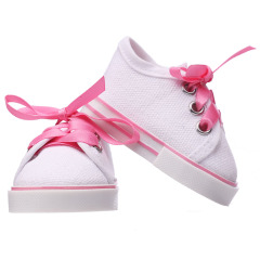 White shoes with red hearts