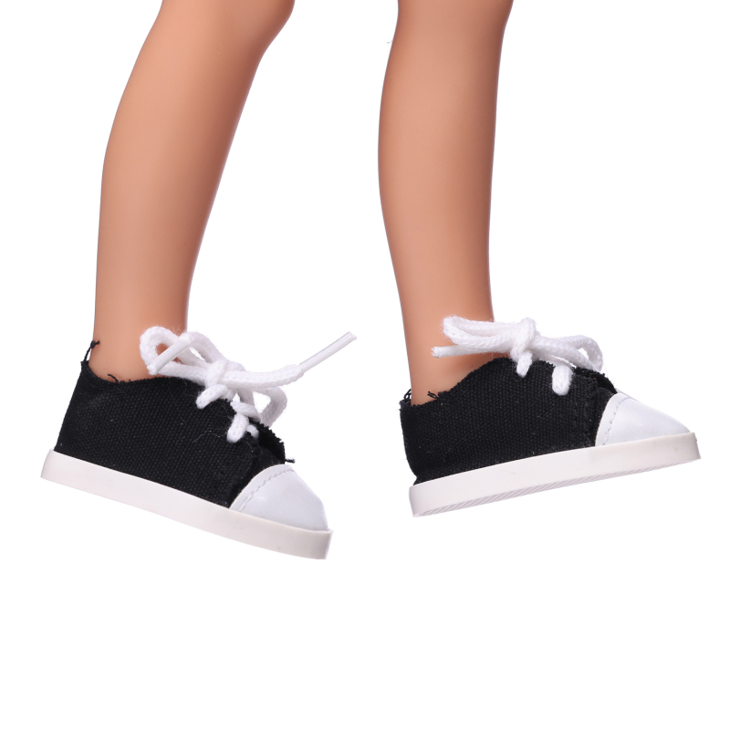 Small sneakers with black canvas and white LACES