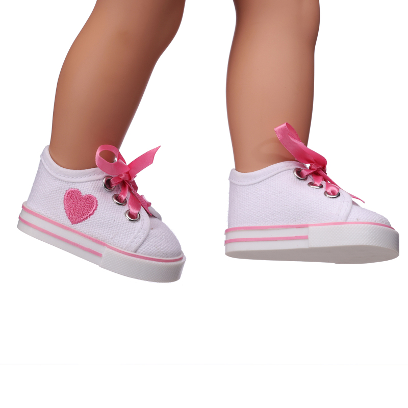 White shoes with red hearts