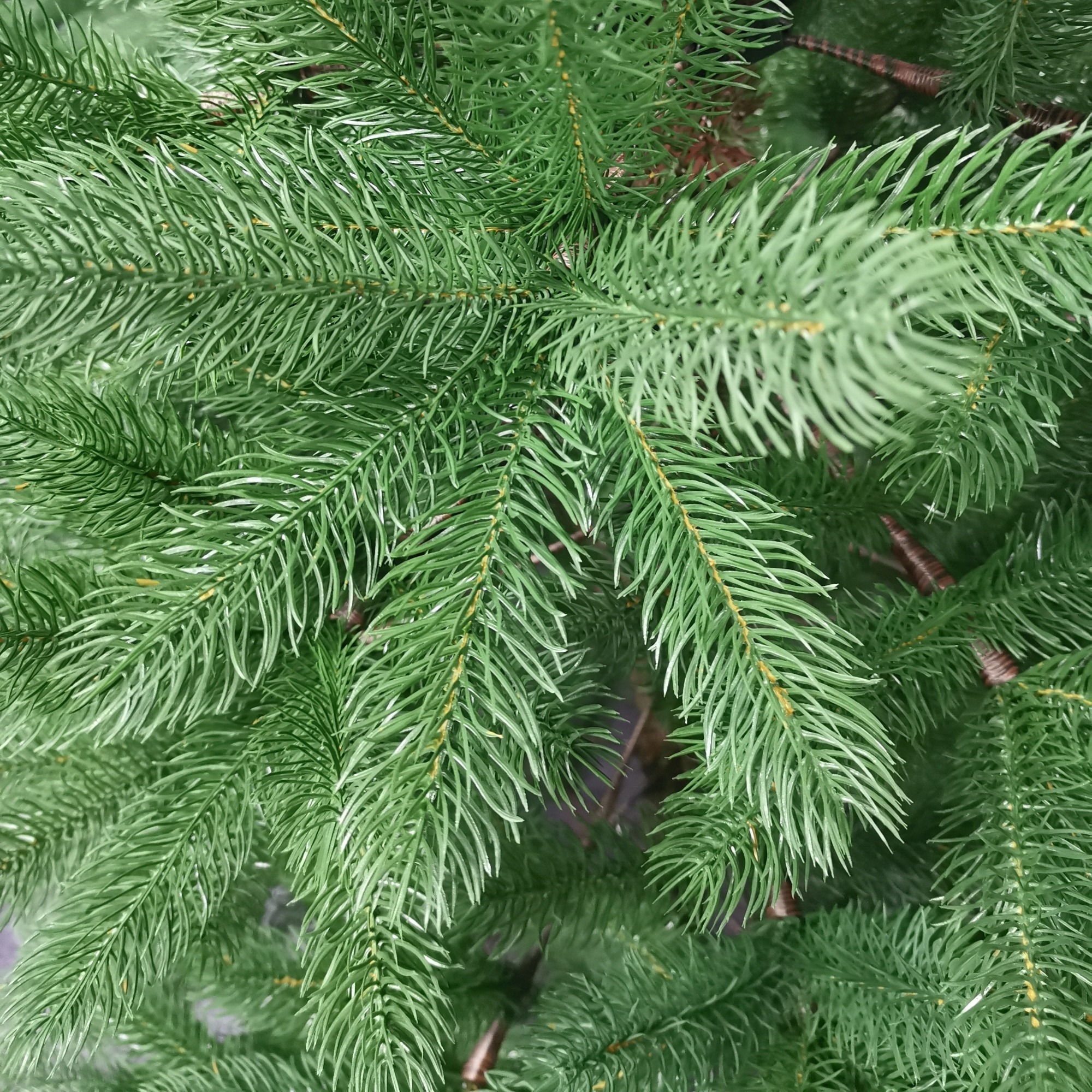 PE vs. PVC Artificial Christmas Trees: A Guide for Wholesalers