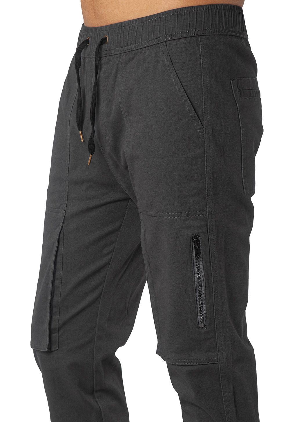 Close-up of metal zipper pocket on black slim-fit joggers for secure phone storage