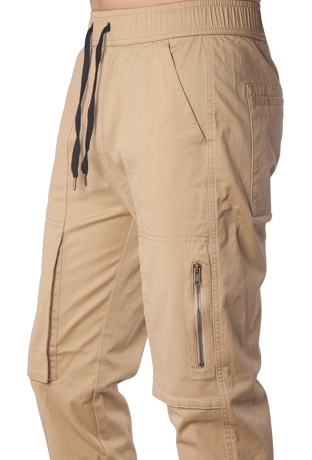 Close-up of metal zipper pocket on black slim-fit joggers for secure phone storage