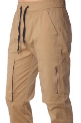 Close-up of metal zipper pocket on black slim-fit joggers for secure phone storage