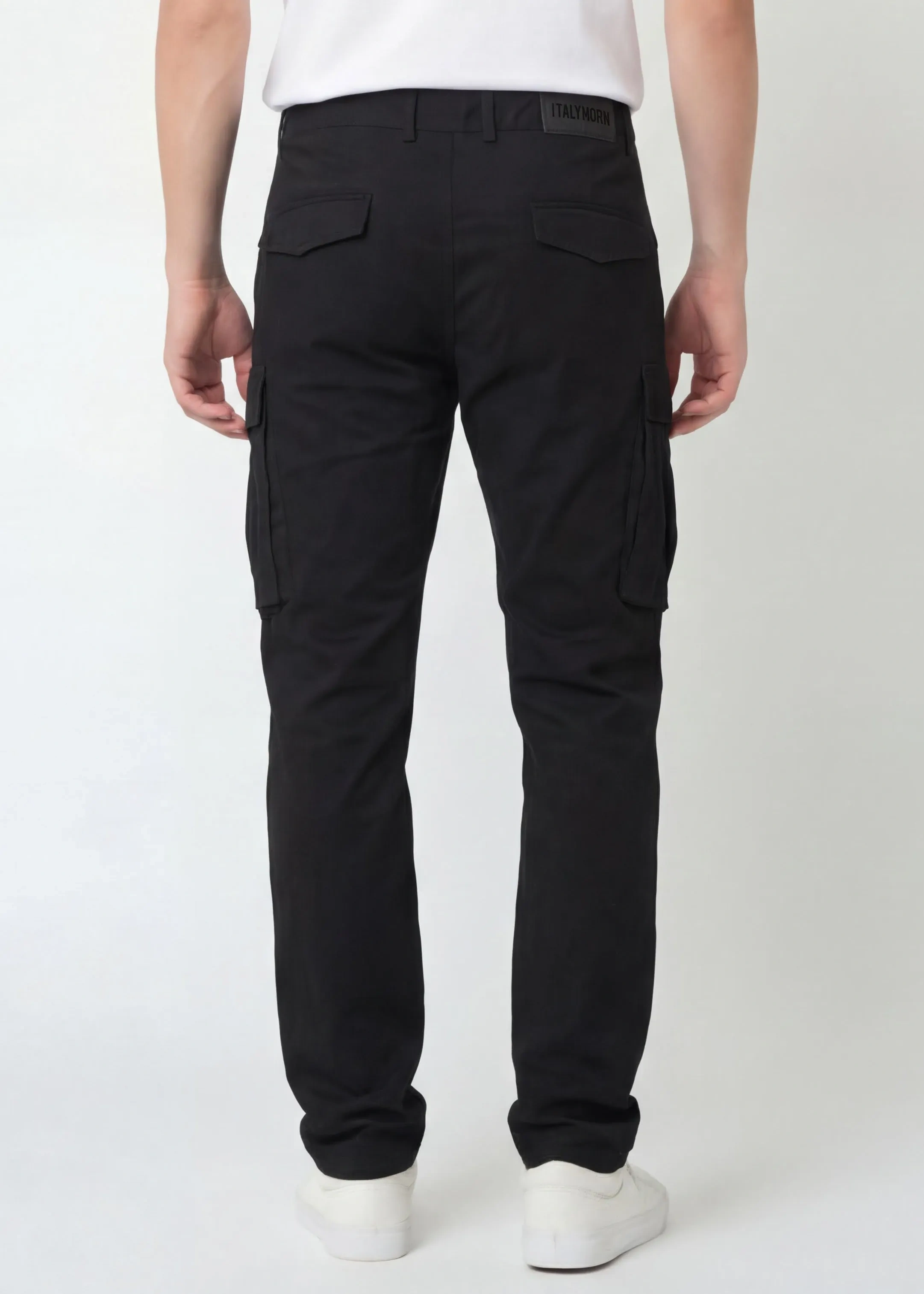 Back view of ItalyMorn men's black cargo pants, showcasing the clean tailored fit, dual rear pockets with flaps, and the sleek profile of the side cargo pockets.