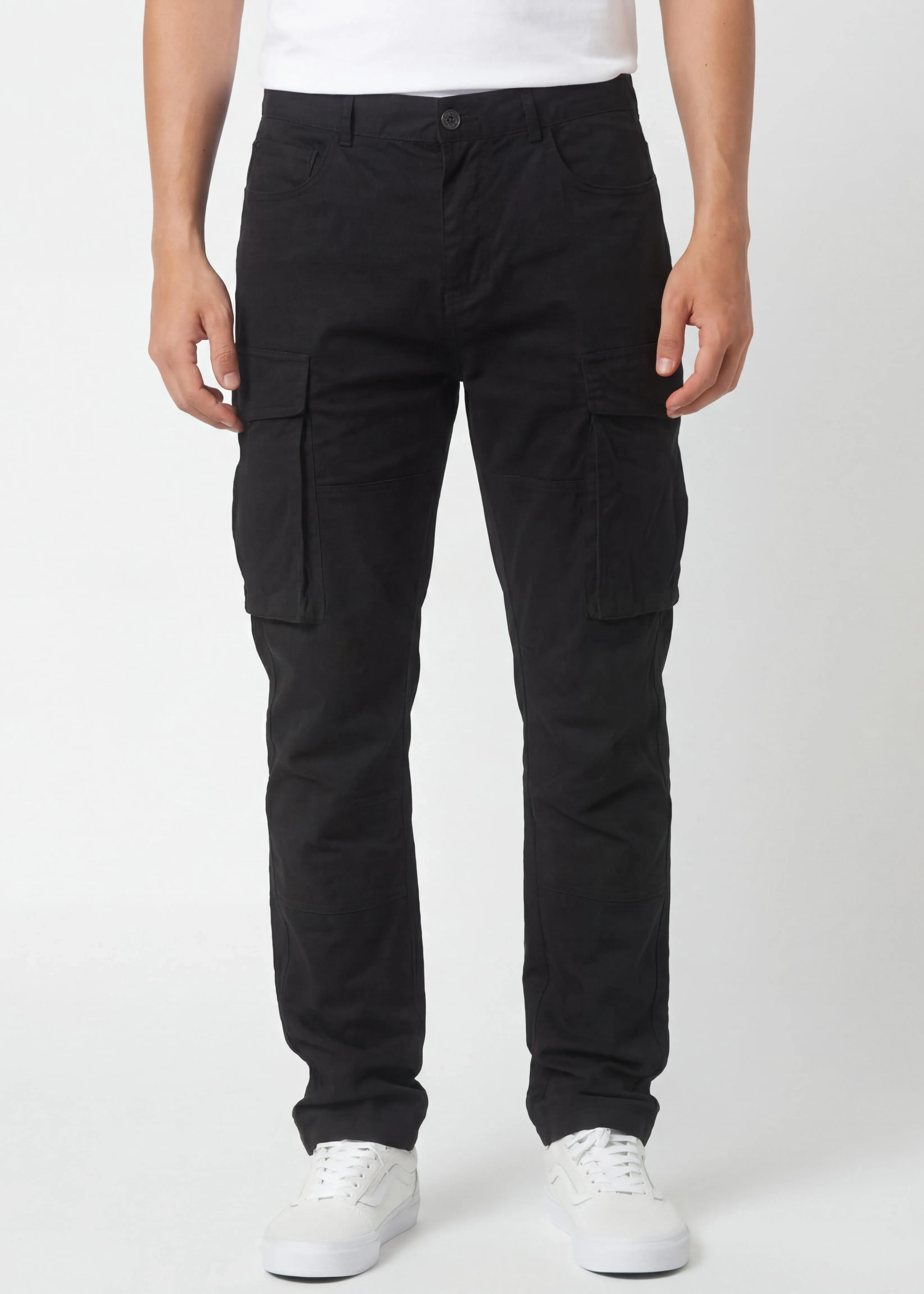 Front view of ItalyMorn men's black cargo pants on a model, featuring a classic straight-leg fit, functional side cargo pockets, and paired with white sneakers for a versatile everyday look.
