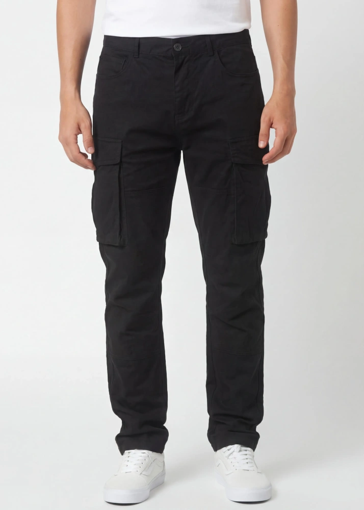 Front view of ItalyMorn men's black cargo pants on a model, featuring a classic straight-leg fit, functional side cargo pockets, and paired with white sneakers for a versatile everyday look.
