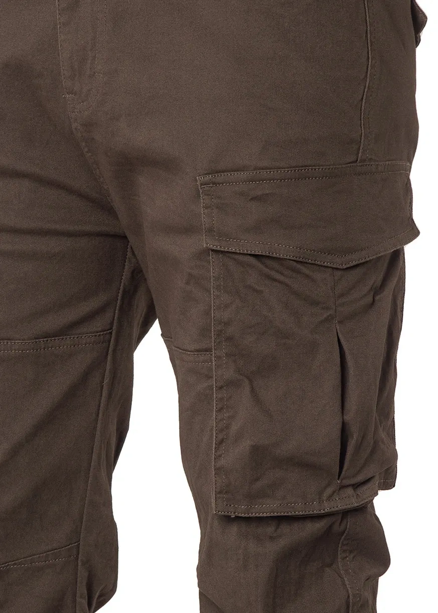Close-up detail of ItalyMorn men's coffee brown cargo pants, highlighting the durable fabric texture, reinforced double stitching, and the secure flap closure of the spacious side cargo pocket.