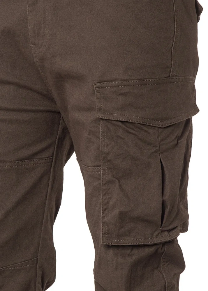 Close-up detail of ItalyMorn men's coffee brown cargo pants, highlighting the durable fabric texture, reinforced double stitching, and the secure flap closure of the spacious side cargo pocket.