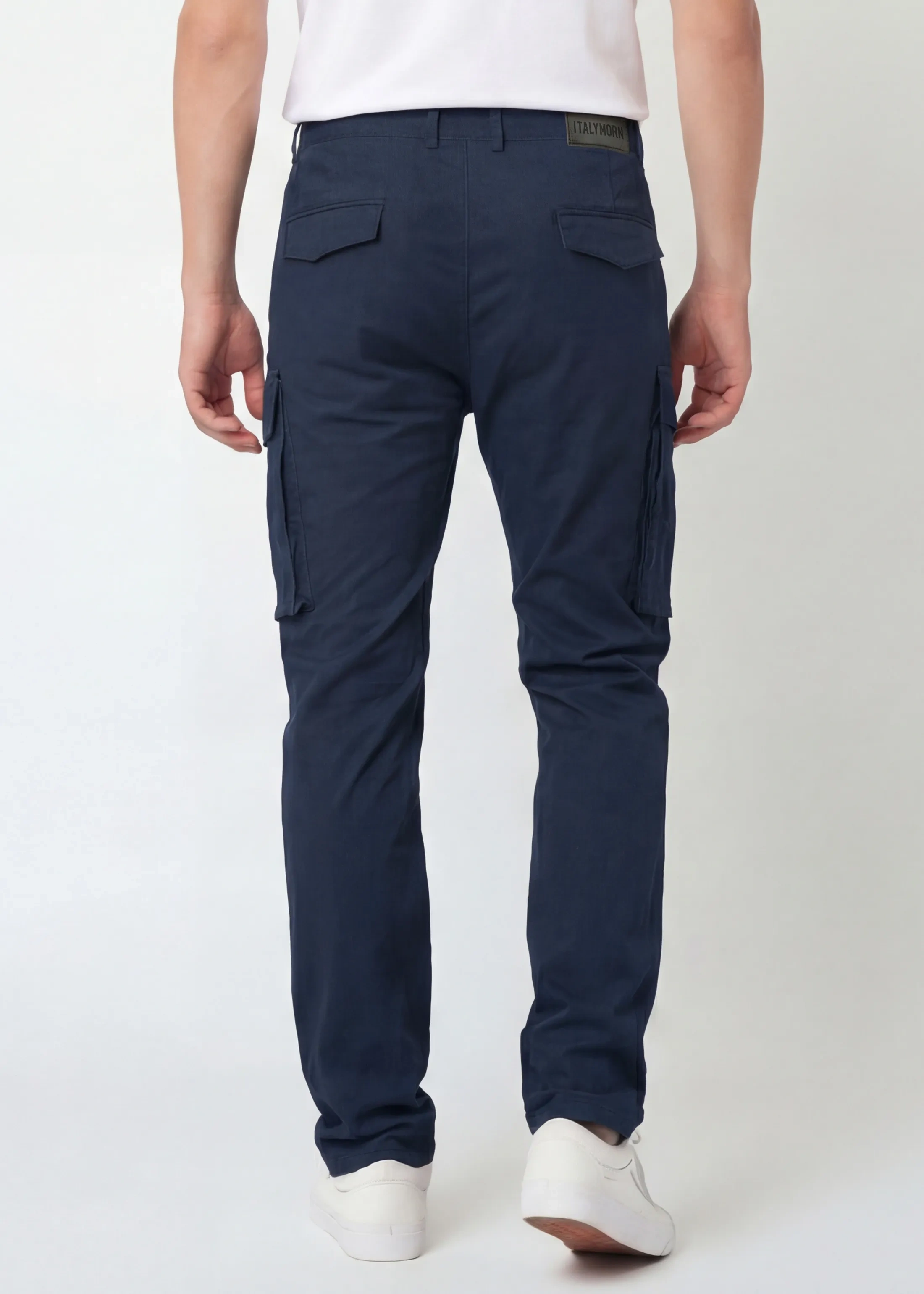Back view of ItalyMorn men's dark blue cargo pants, showcasing the clean tailored fit, dual rear pockets with flaps, and the sleek profile of the side cargo pockets
