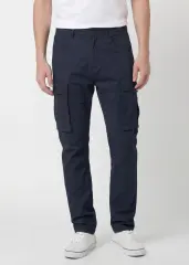 Front view of ItalyMorn men's dark blue cargo pants on a model, featuring a classic straight-leg fit, functional side cargo pockets, and paired with white sneakers for a versatile everyday look.