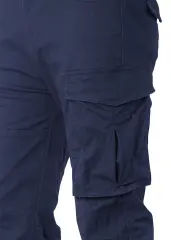 Close-up detail of ItalyMorn men's navy blue cargo pants, highlighting the durable fabric texture, reinforced stitching, and the secure flap closure of the spacious side cargo pocket.