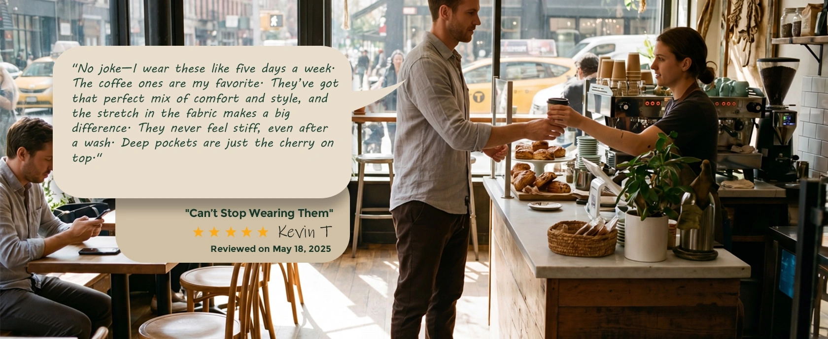 A man wearing ItalyMorn coffee brown joggers buying a drink at a local cafe counter. An overlaid review emphasizes the perfect mix of everyday comfort, style, and the subtle stretch of the fabric.