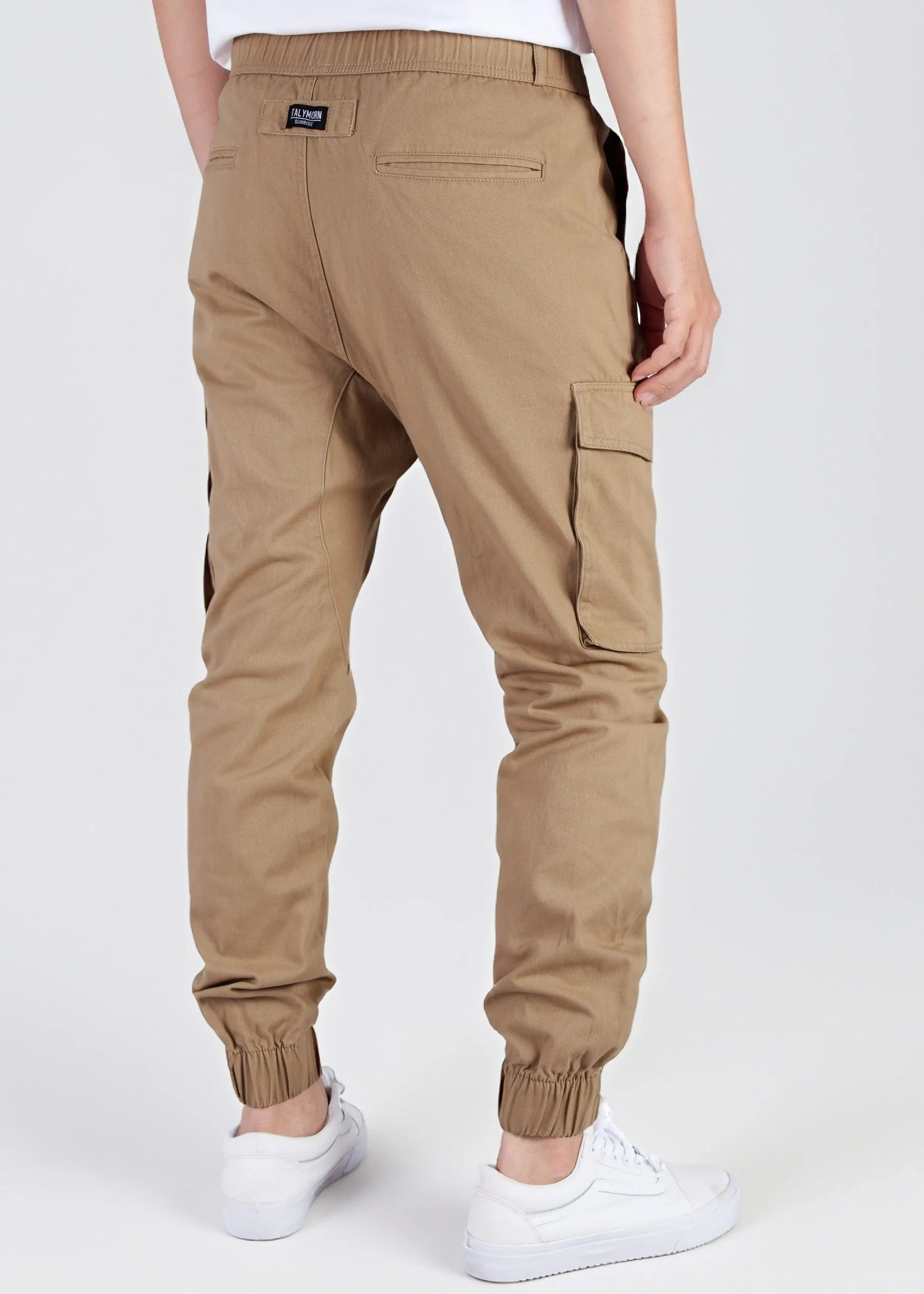 Back view of a male model wearing men's dark khaki cargo joggers, showcasing the comfortable elastic waistband, back welt pockets with the ITALYMORN woven brand label, and side cargo pockets.