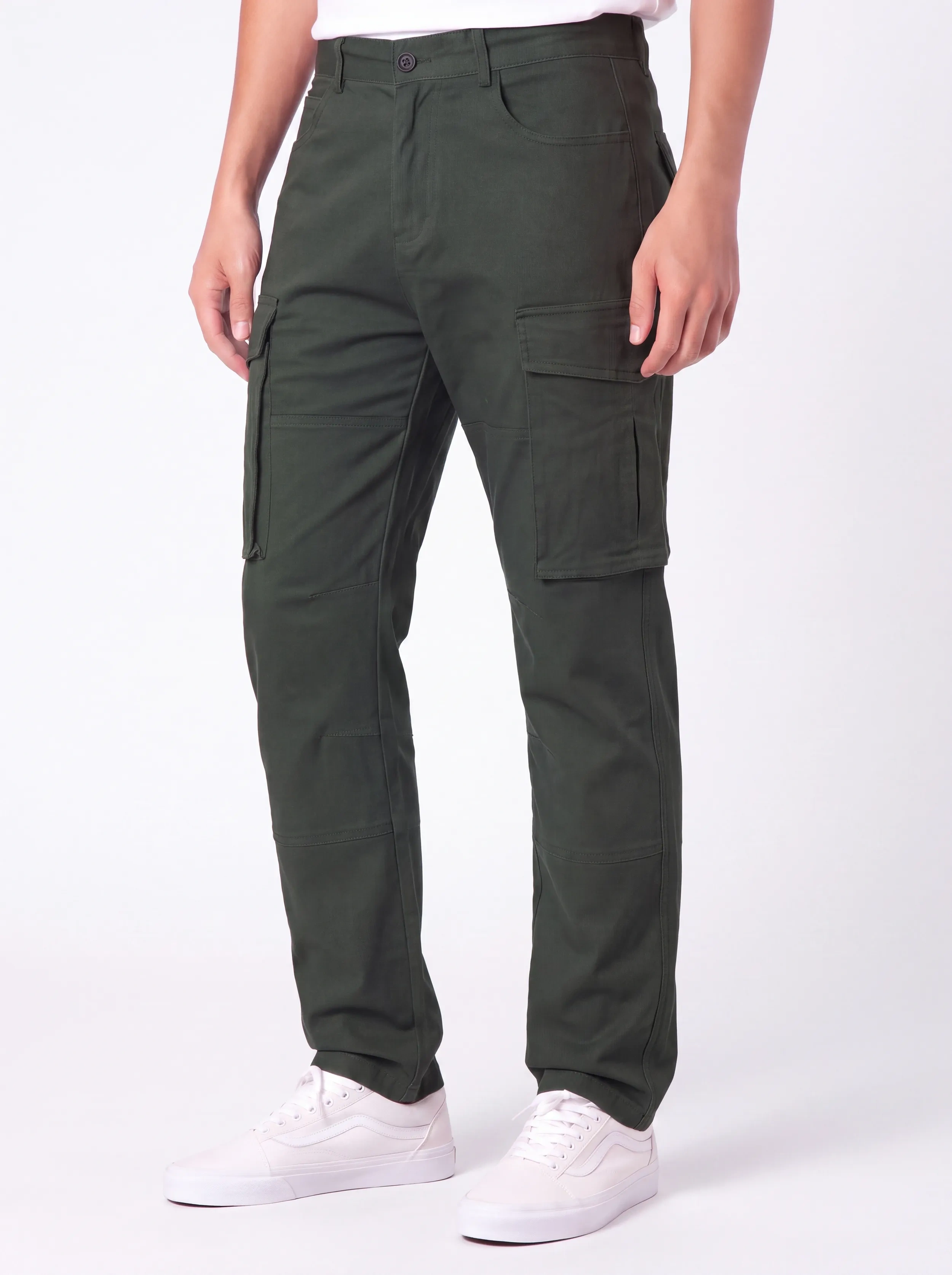 Front view of a male model wearing ITALYMORN men's army green cargo pants, featuring a classic button closure, deep front pockets, and functional side cargo pockets, paired with white sneakers.