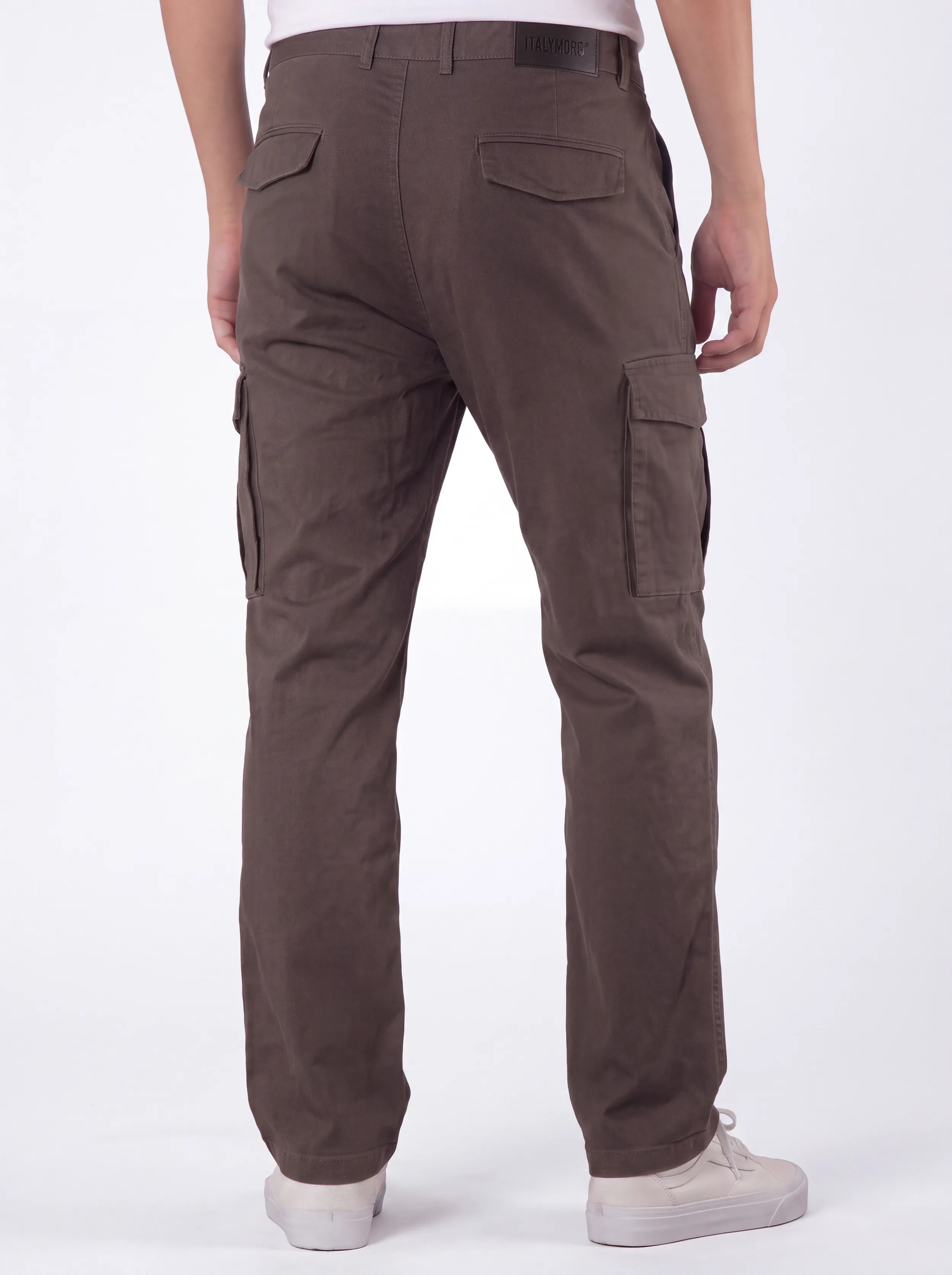 Back view of a male model wearing men's coffee brown cargo pants, showcasing a tailored fit, secure flap back pockets with the ITALYMORN brand patch, and a reinforced waistband.