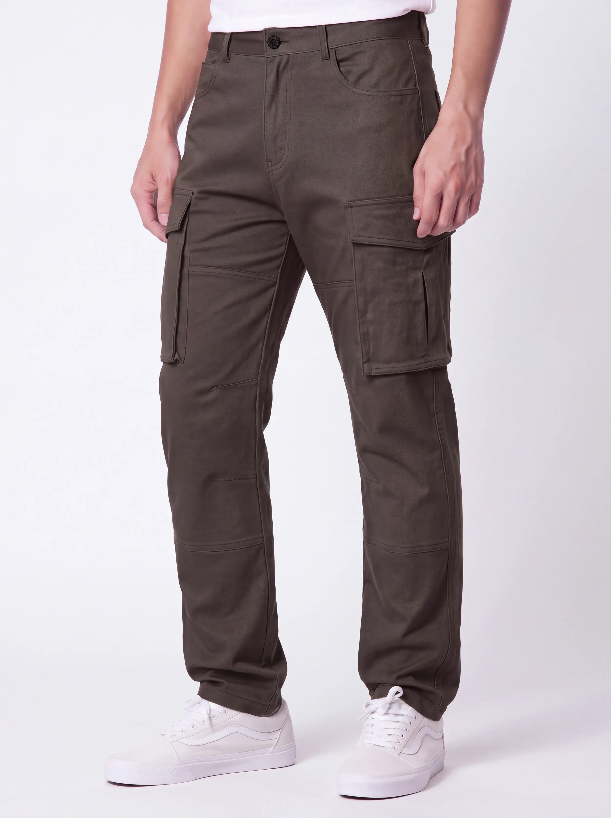 Front view of a male model wearing ITALYMORN men's coffee brown cargo pants, featuring a classic button closure, deep front pockets, and functional side cargo pockets, paired with white sneakers.