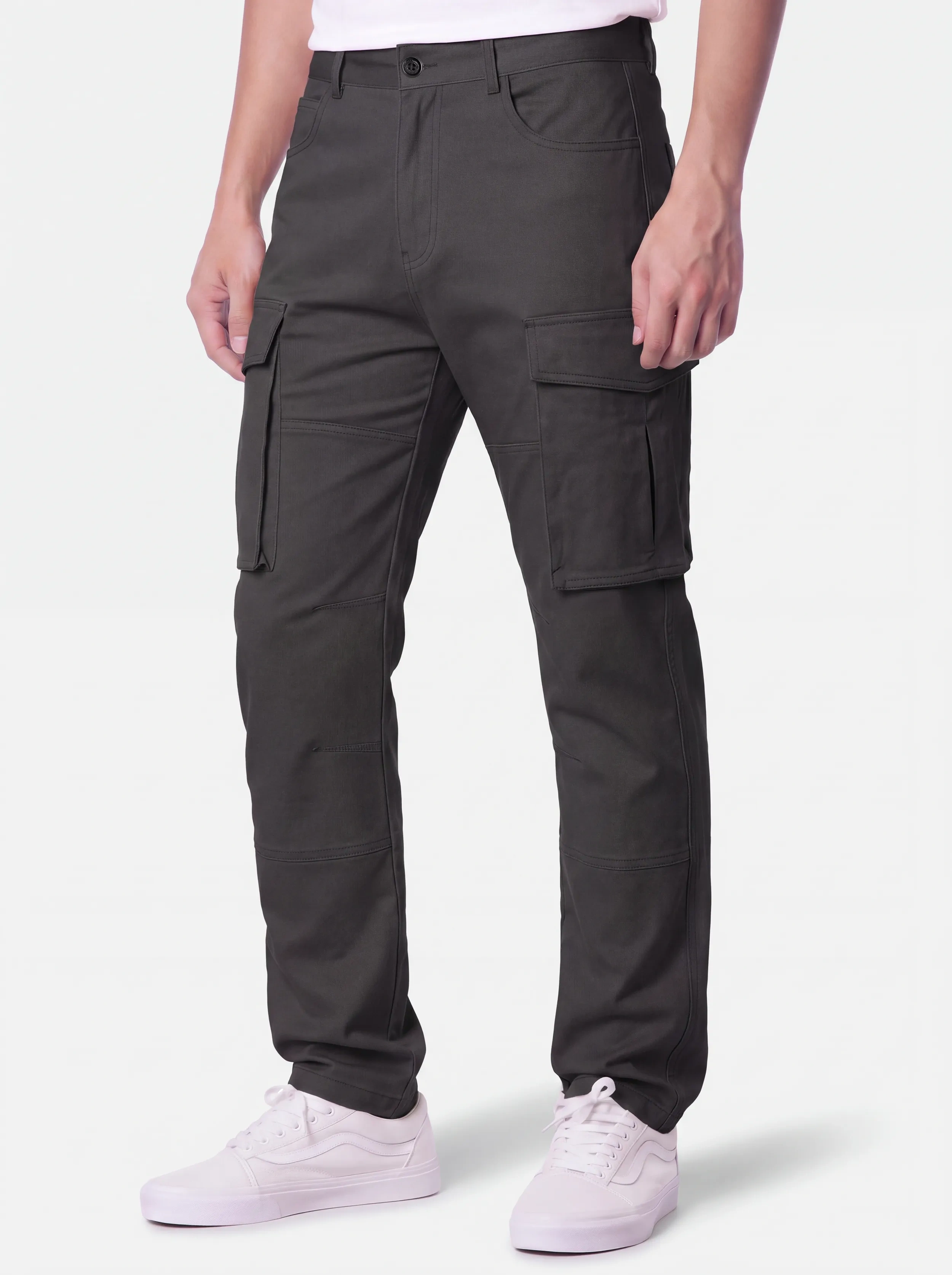Front view of a male model wearing ITALYMORN men's dark grey cargo pants, featuring a classic button closure, deep front pockets, and functional side cargo pockets, paired with white sneakers.