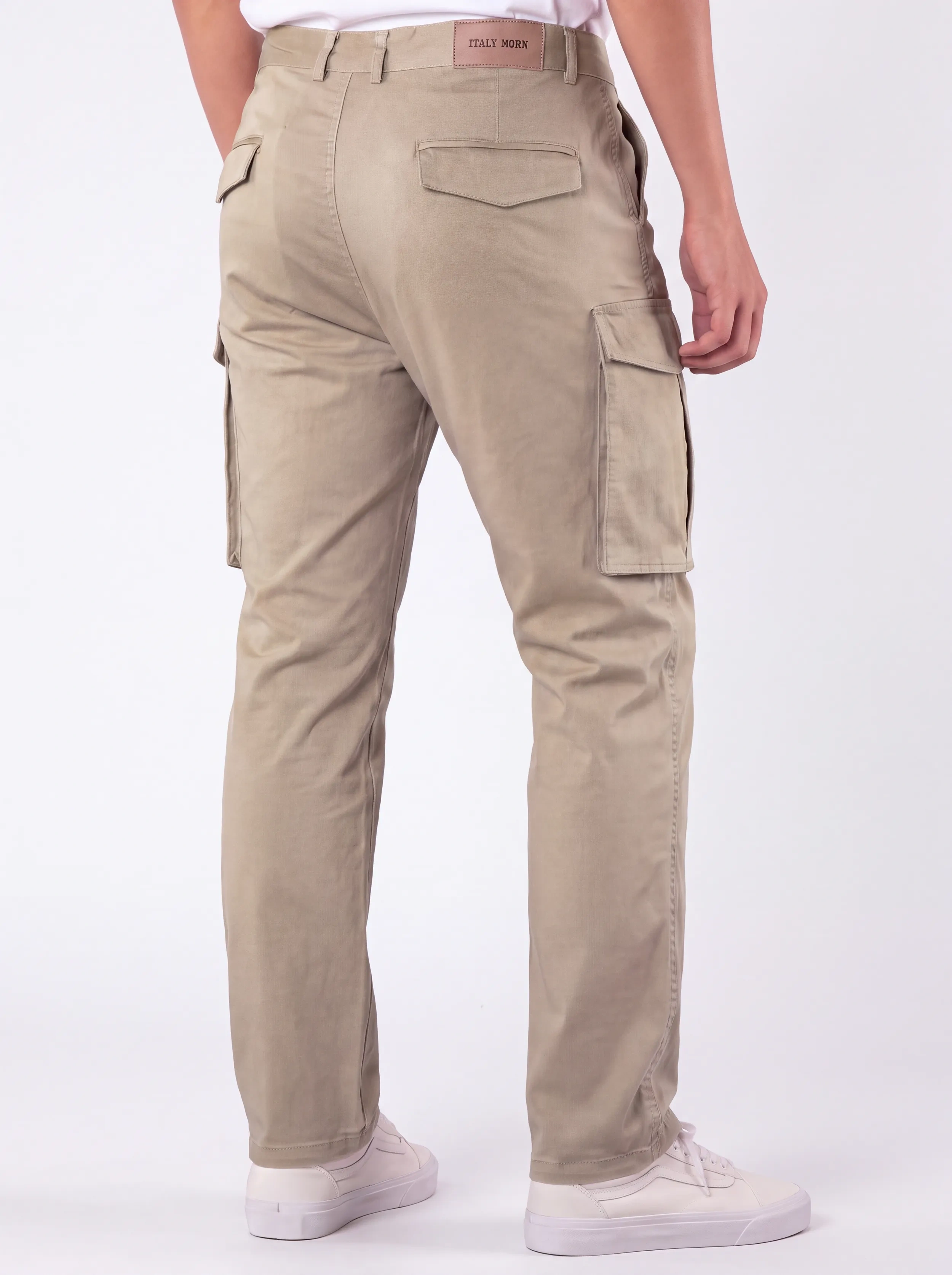  Back view of a male model wearing men's khaki cargo pants, showcasing a tailored fit, secure flap back pockets with the ITALYMORN brand patch, and a reinforced waistband.