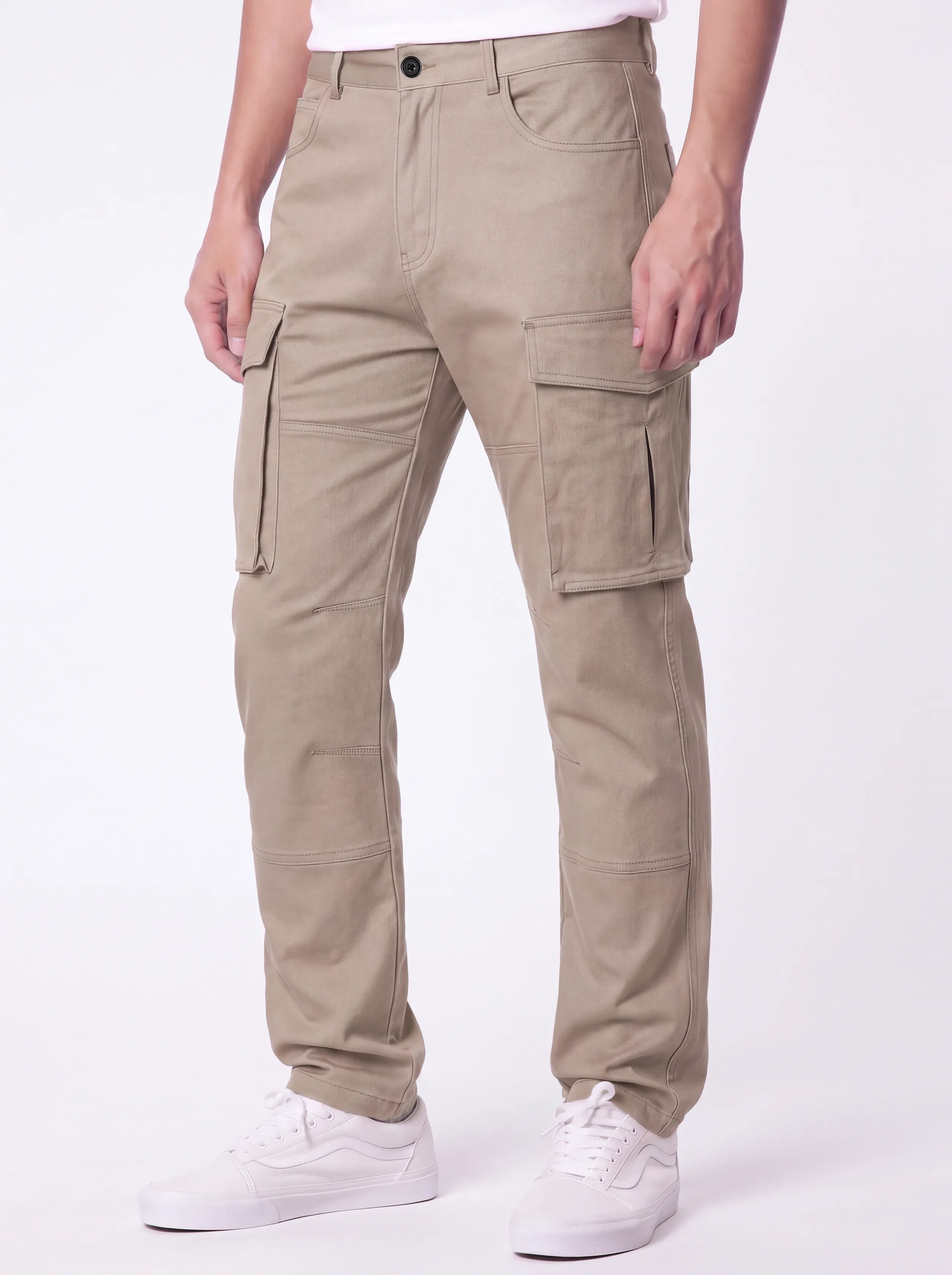 Front view of a male model wearing ITALYMORN men's khaki cargo pants, featuring a classic button closure, deep front pockets, and functional side cargo pockets, paired with white sneakers.
