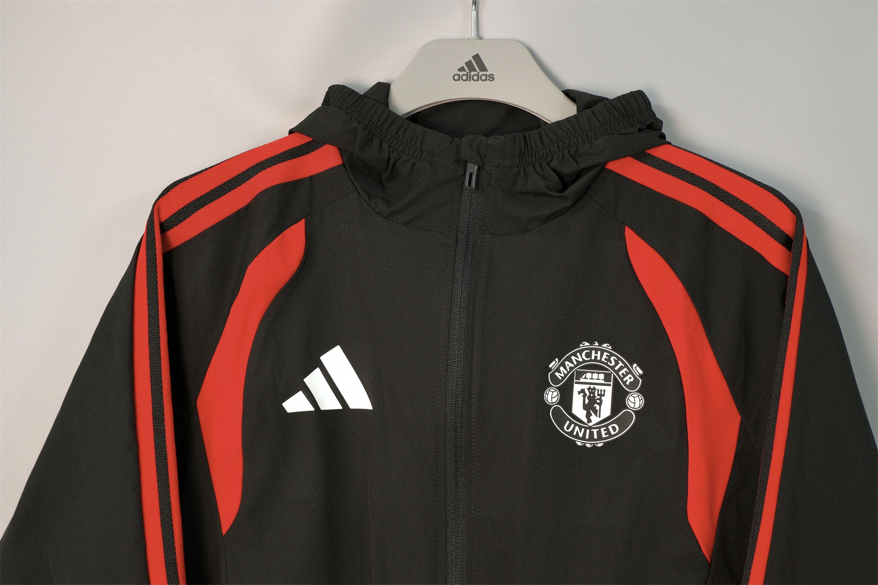 26/27 Manchester United Black Hooded Windbreaker