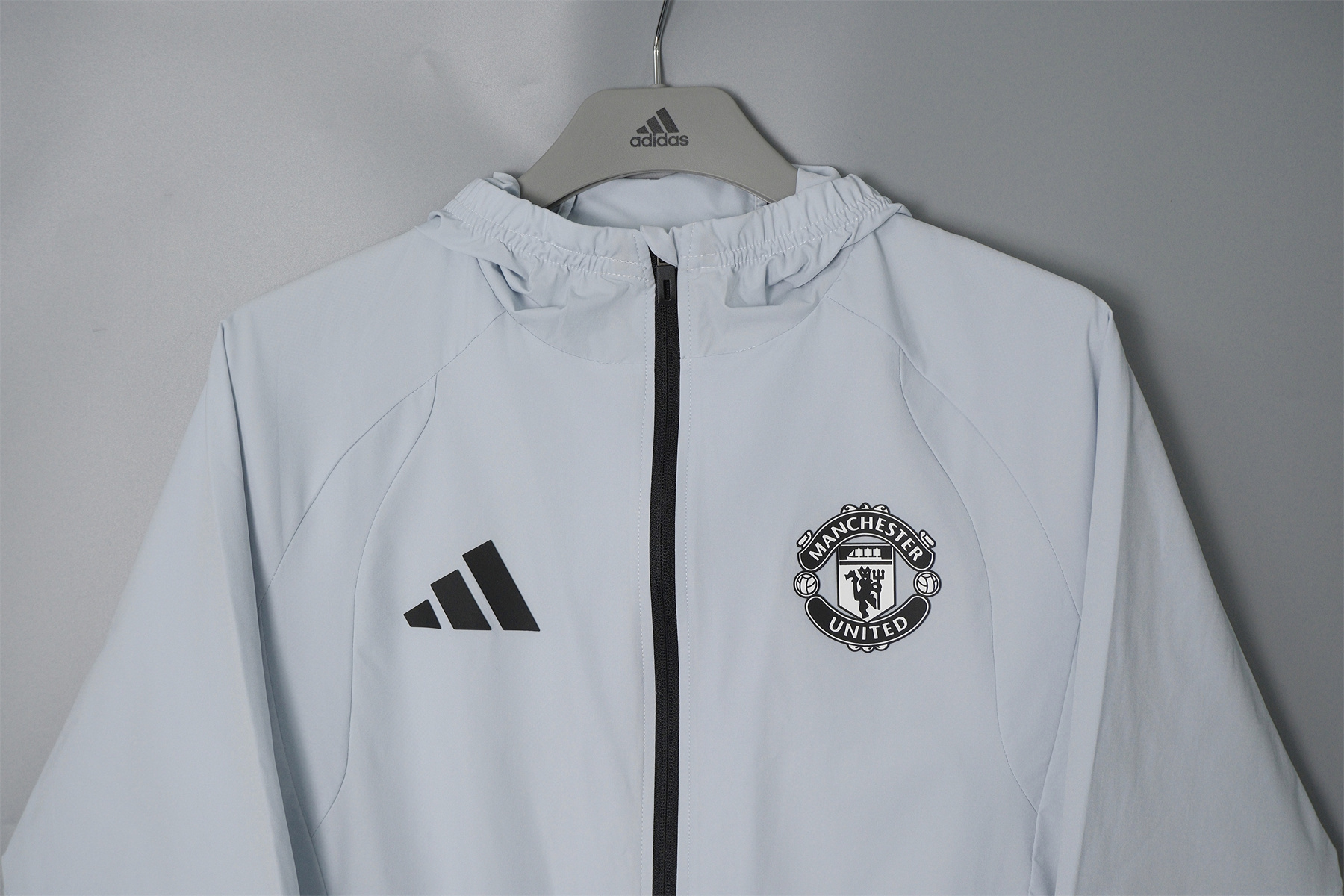 26/27 Manchester United Light Grey Hooded Windbreaker