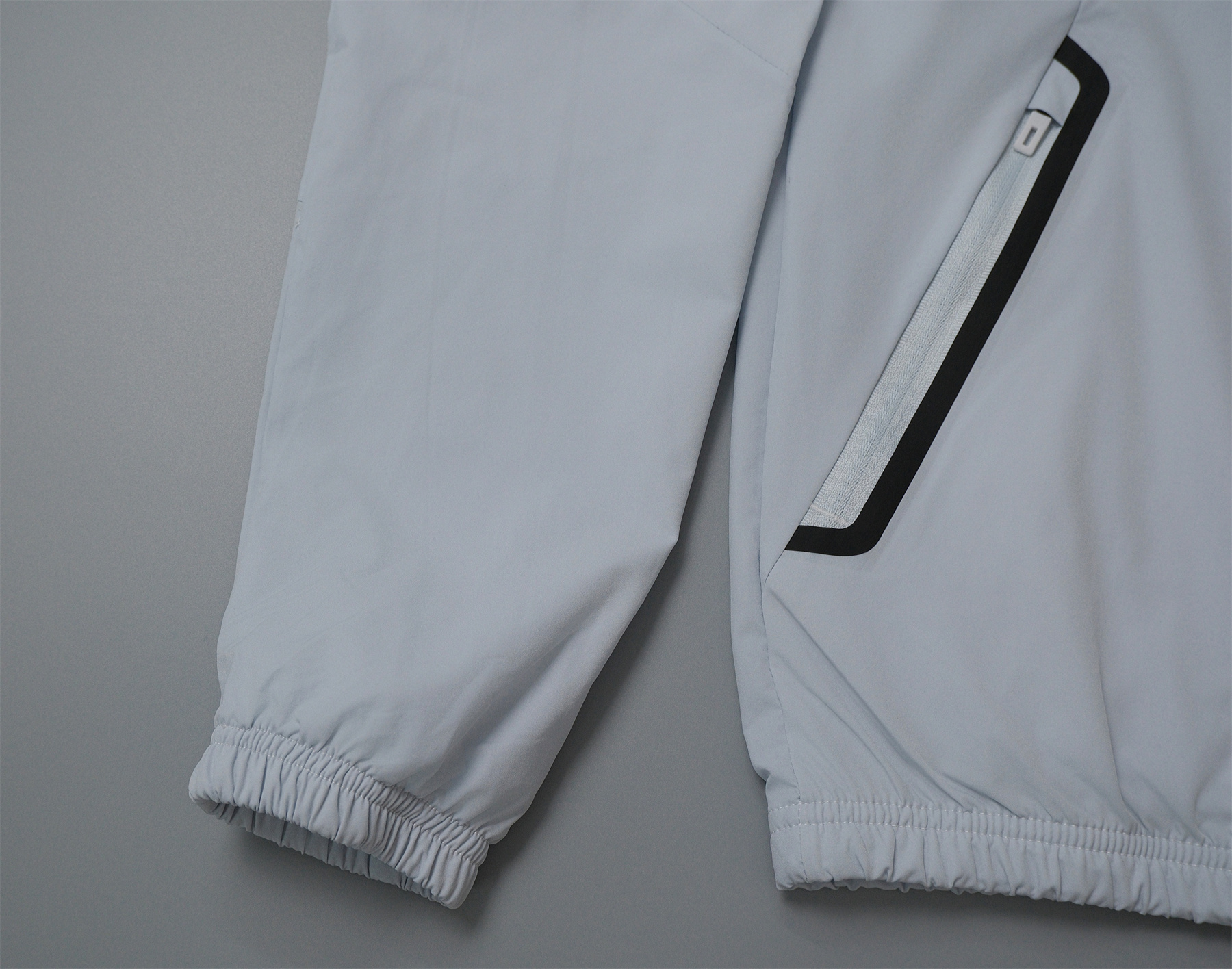26/27 Arsenal Light Grey Hooded Windbreaker