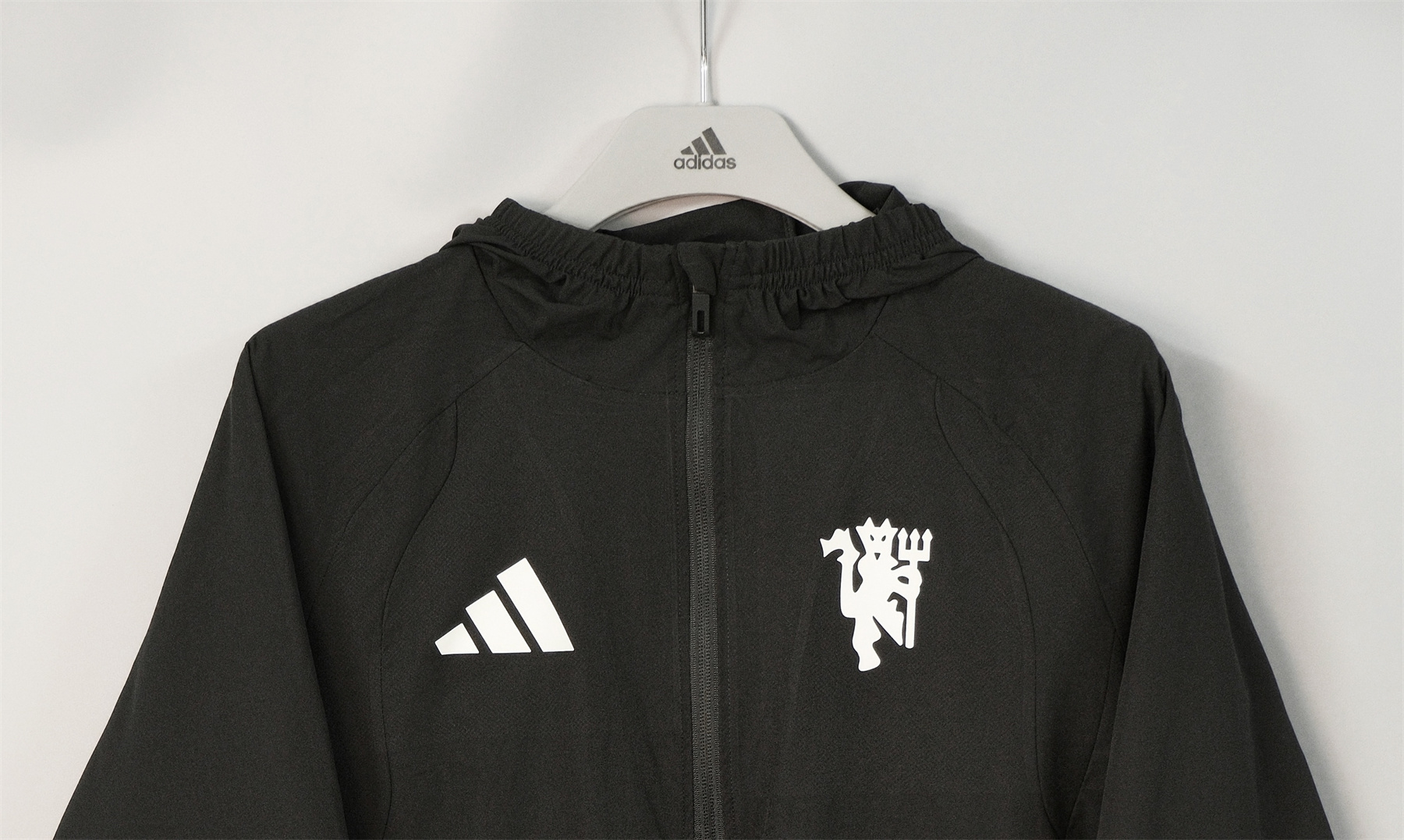 26/27 Manchester United Black Hooded Windbreaker