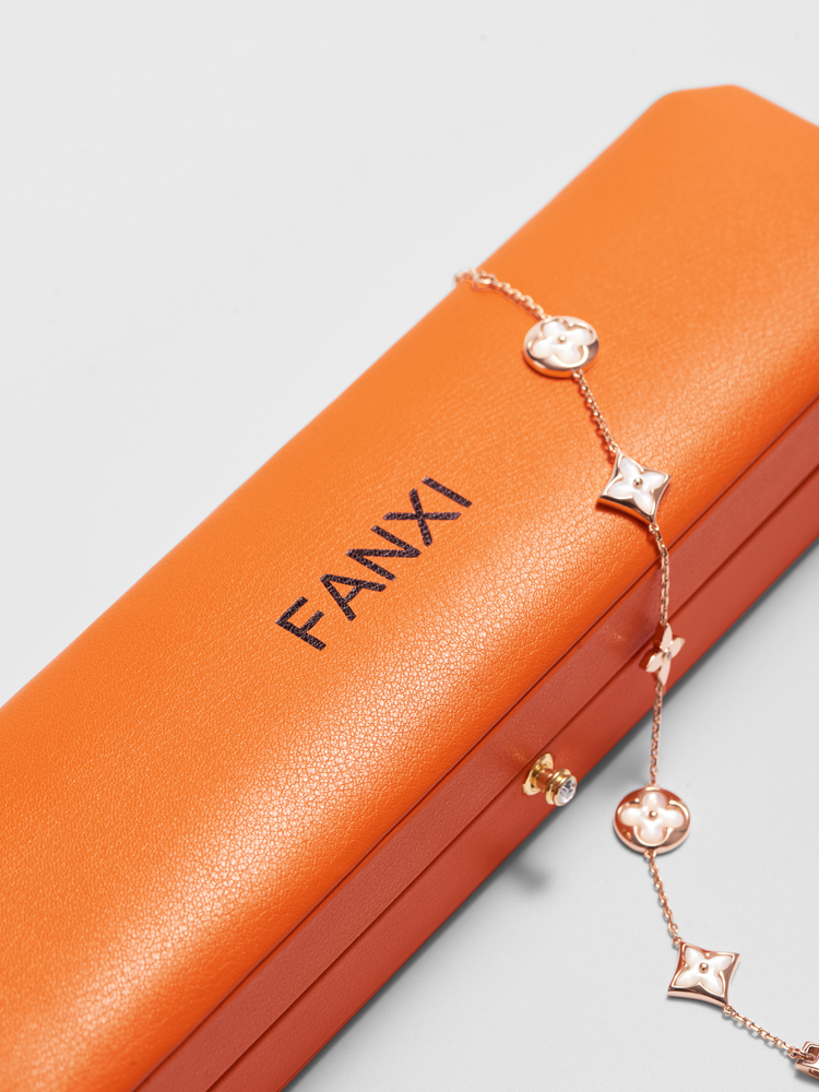 FANXI H136 hot sale custom orange PU leather jewelry box with gold stamp logo ring earrings necklace bracelet jewelry packaging