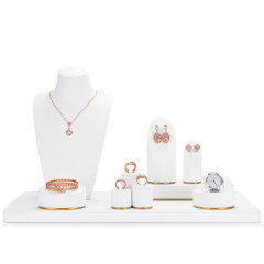 FANXI TT033 elegant white microfiber jewelry display set with golden metal frame base
