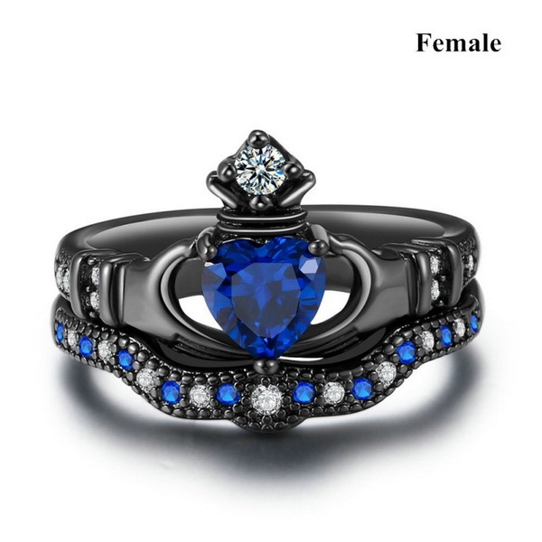 Ladies holding sapphire heart-shaped crown ring couple combination ring