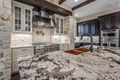 Unionlands Cabinetry Raised Panel Applied Molding Two Tone Black Painted With Marble Countertop
