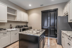 Unionlands Cabinetry Raised Panel Applied Molding Two Tone Black Painted With Marble Countertop