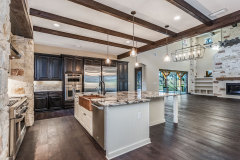 Unionlands Cabinetry Raised Panel Applied Molding Two Tone Black Painted With Marble Countertop